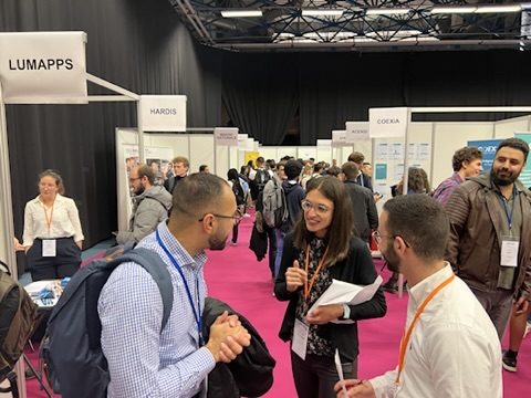 Conversations between stands at an industry conference